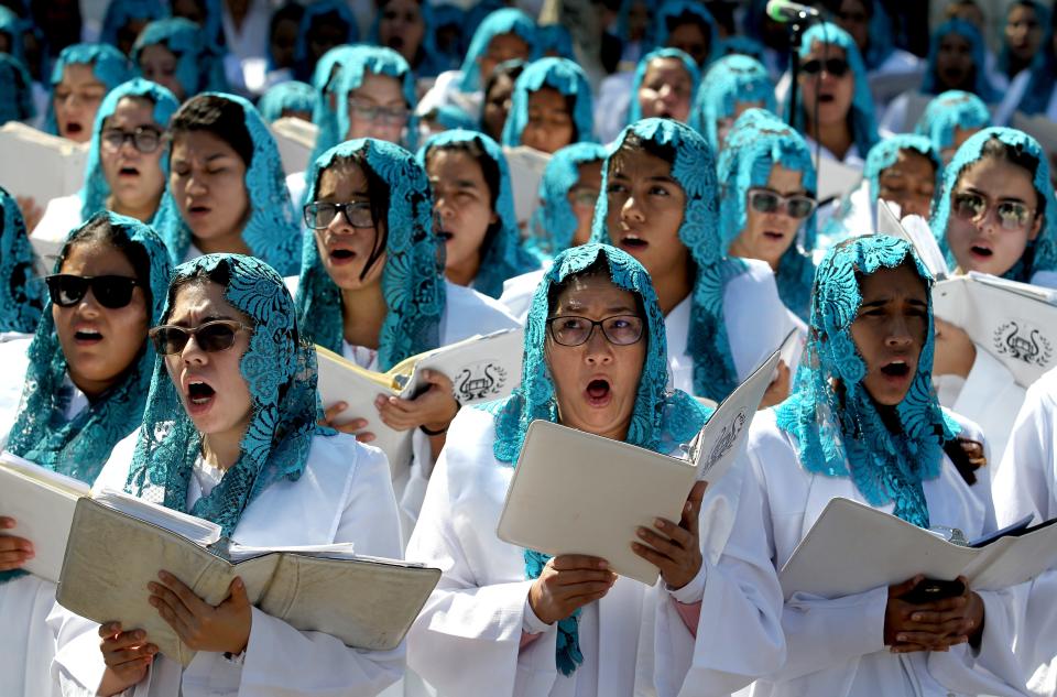 Followers of the Mexican-based Pentecostal church Luz del Mundo (Light of the World), participate in a baptism ceremony in Guadalajara, Jalisco state, Mexico, on November 10, 2019. - The controversial Luz del Mundo Church held its mass baptism ceremony in the main square of Guadalajara, while its leader Naason Joaquin Garcia is imprisoned in the United States awaiting trial on charges of rape of minors, among others.