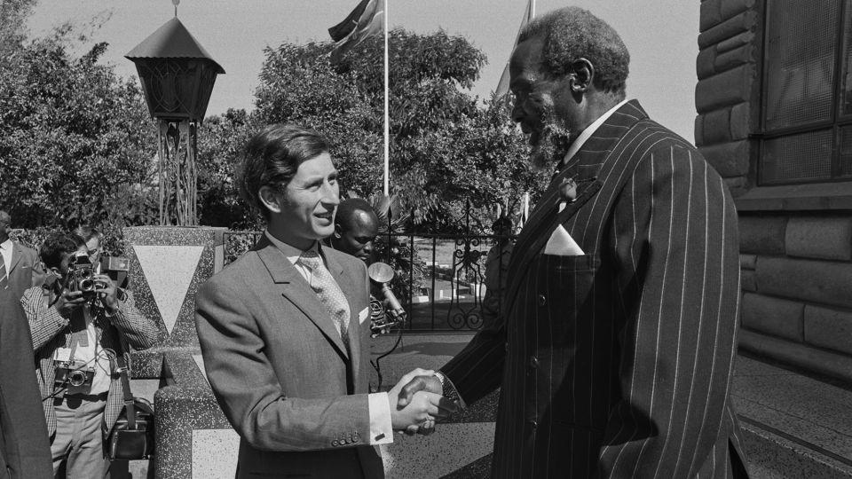 Charles shaking hands with Kenyan president Jomo Kenyatta at his country home at Gatundi, near Nairobi, Kenya in 1971. - Keystone/Hulton Royals Collection/Getty Images