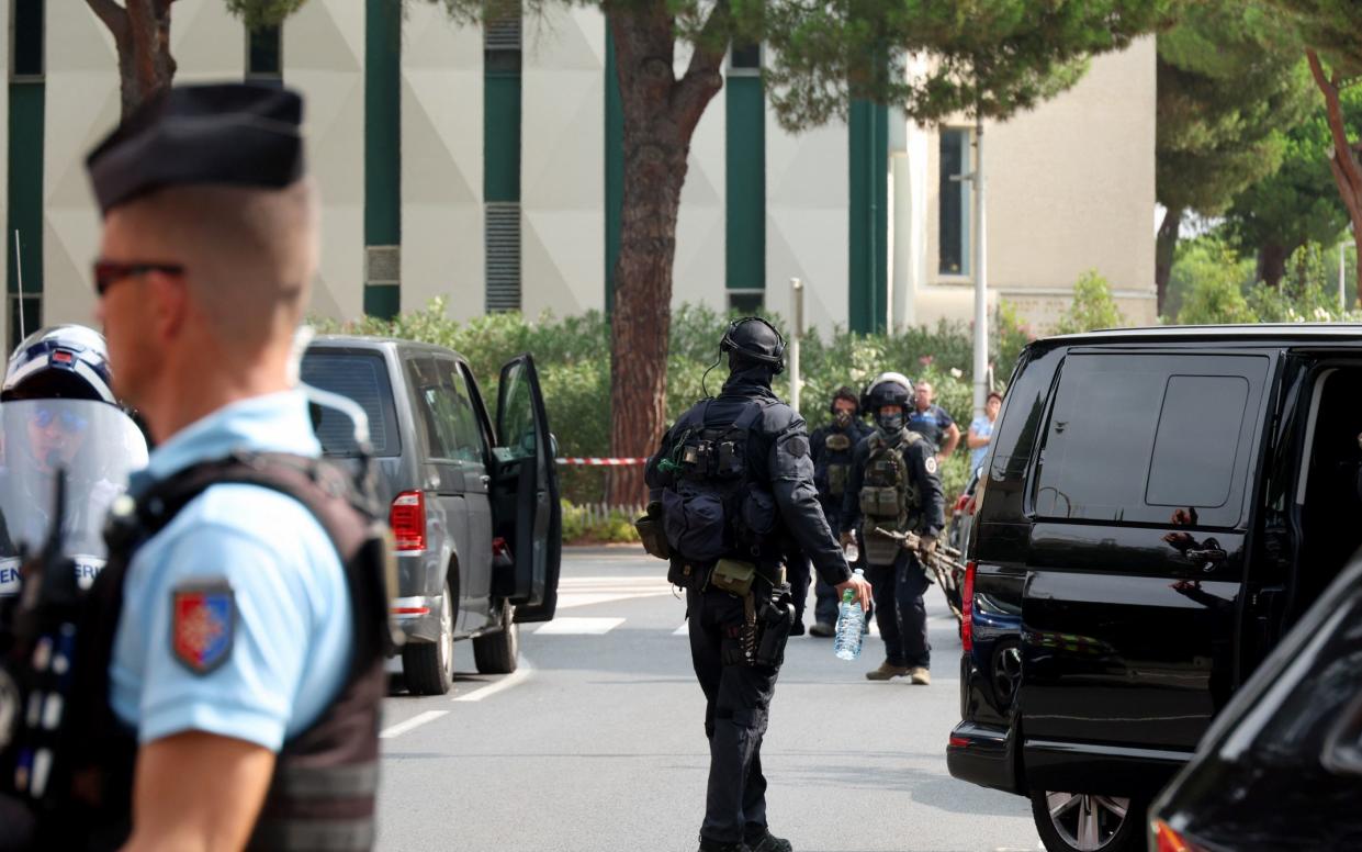 Police officers at the scene of the attack at the Beth Yaacov synagogue in La Grande-Motte