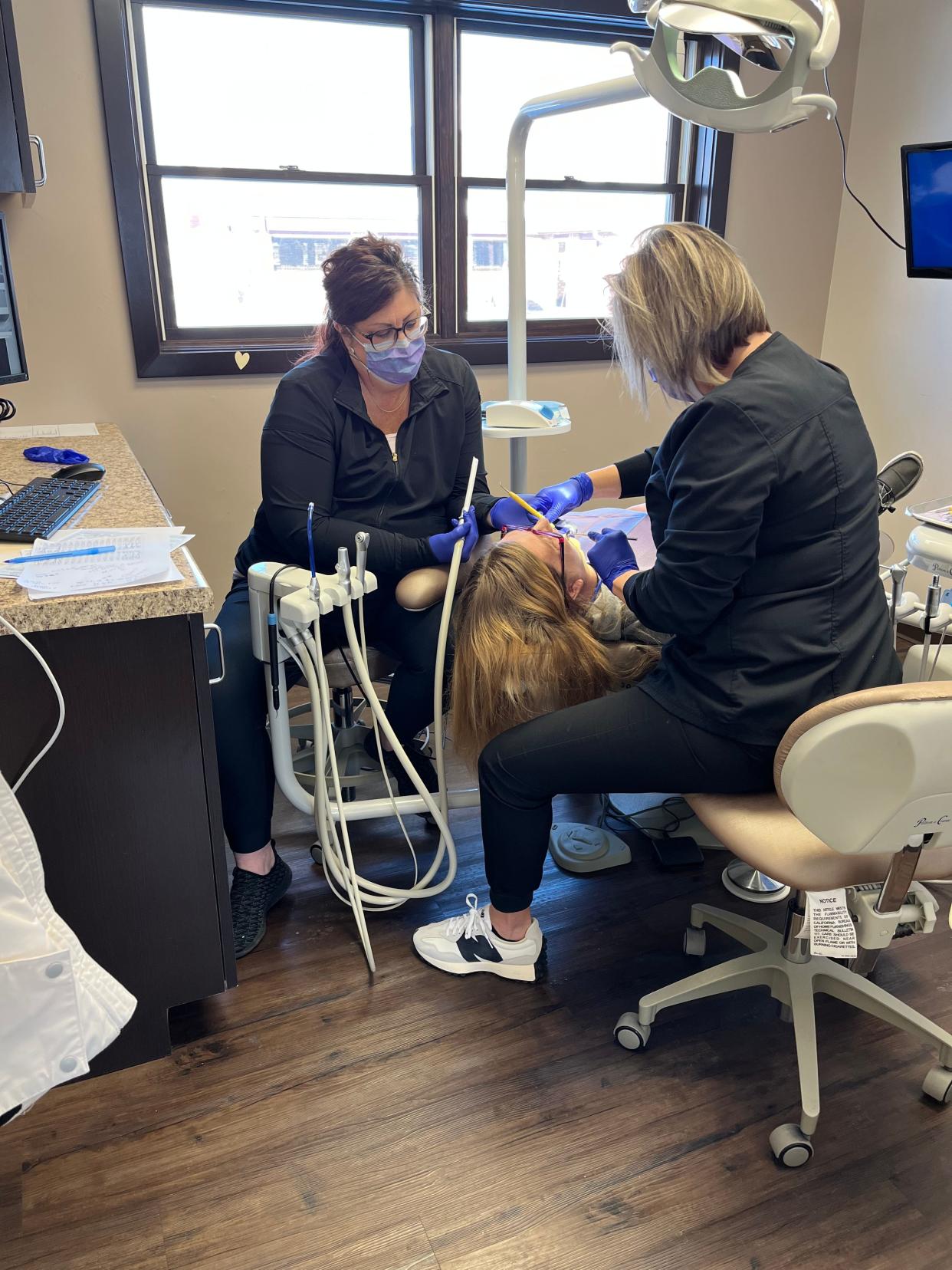 Michelle Klass, a resident of N.E.W. Community Shelter, hasn't been to the dentist in 20 years. Despite her history of bad dentists, the aides at Meadowbrook Smiles were gentle and took good care of her, she said.