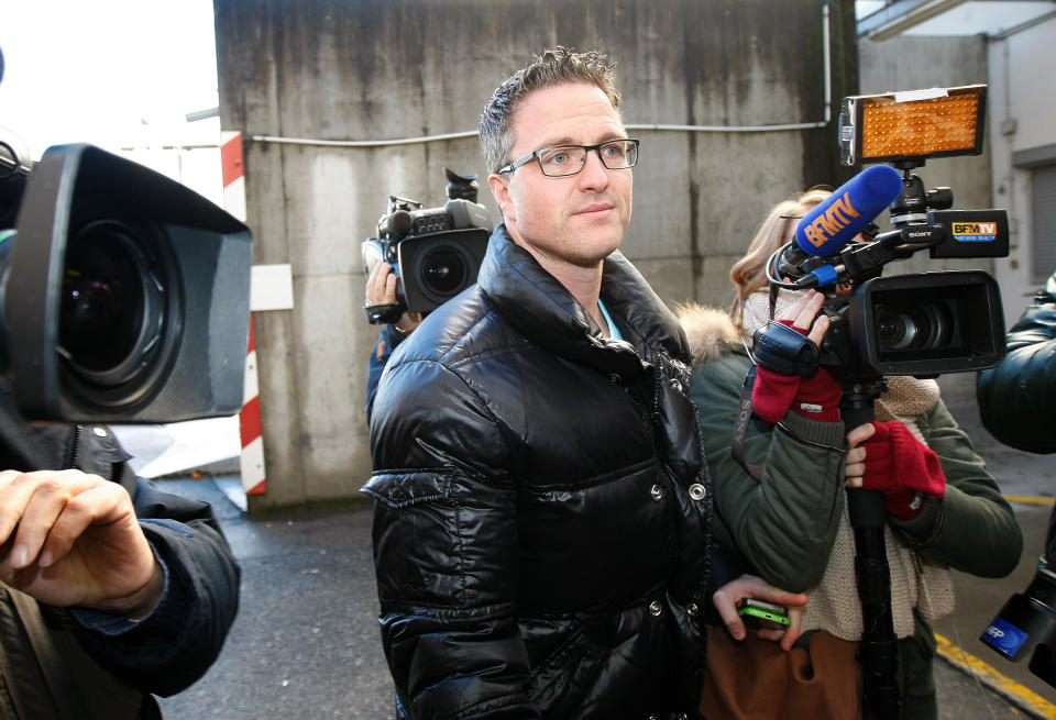 Michael Schumacher's brother Ralf arrives at Grenoble Hospital, French Alps, Sunday Jan. 5, 2014, where former seven-time Formula One champion Michael Schumacher is being treated after sustaining a head injury during a ski accident. Schumacher has been in a medically induced coma since Sunday, Dec. 29, 2013, when he struck his head on a rock while on a family vacation. (AP Photo/Claude Paris)