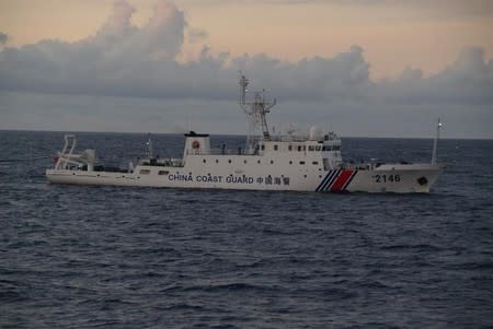 China Coast Guard vessel No. 2146 sails in the East China Sea near the disputed isles known as Senkaku isles in Japan and Diaoyu islands in China, in this handout photo taken and released by the 11th Regional Coast Guard Headquarters-Japan Coast Guard August 8, 2013. REUTERS/11th Regional Coast Guard Headquarters-Japan Coast Guard/Handout via Reuters