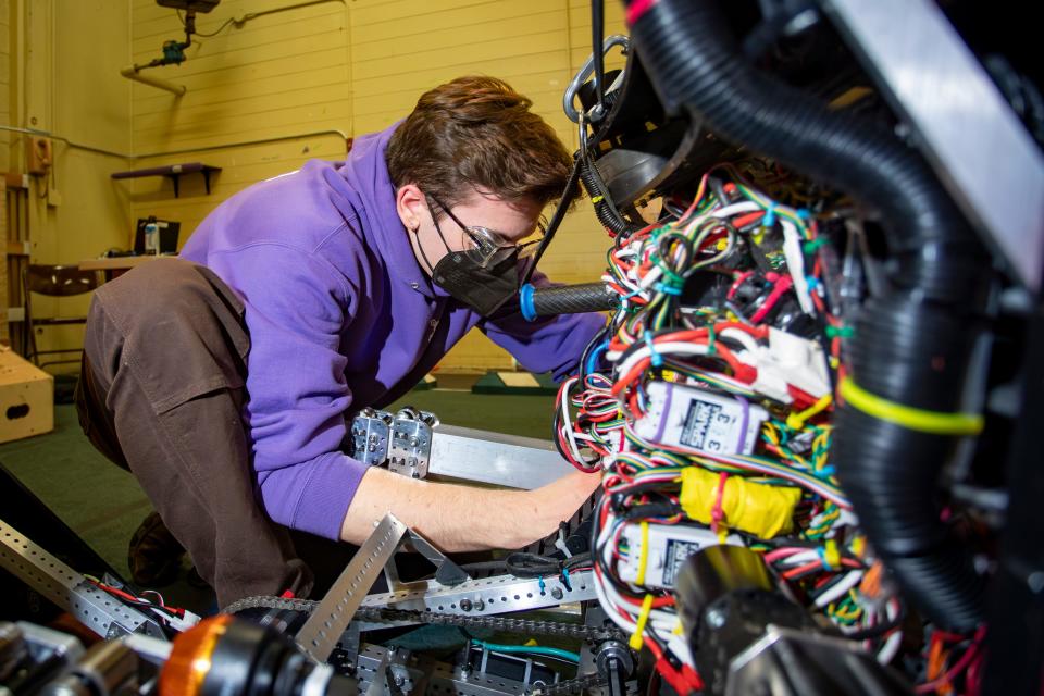 Callaway Macovis works on the school’s robot during a meeting of the South Eugene Robotics Team Tuesday, March 19, 2024, at South Eugene High School.