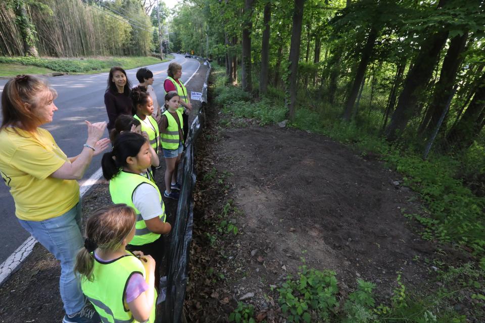 Carolyn Hill of The Turtles of Western Highway shows a turtle nesting area to scouts from troop 40091 Girls Scouts of Tappan Zee service unit May 23, 2023. 