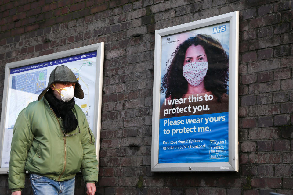 A man wearing a face mask walk past the NHS COIVD-19 public information campaign poster in London. Health Secretary Matt Hancock has told London MPs that the capital will be moved into tier three COVID-19 restrictions imminently following a sharp rise in coronavirus infection rates. (Photo by Dinendra Haria / SOPA Images/Sipa USA)