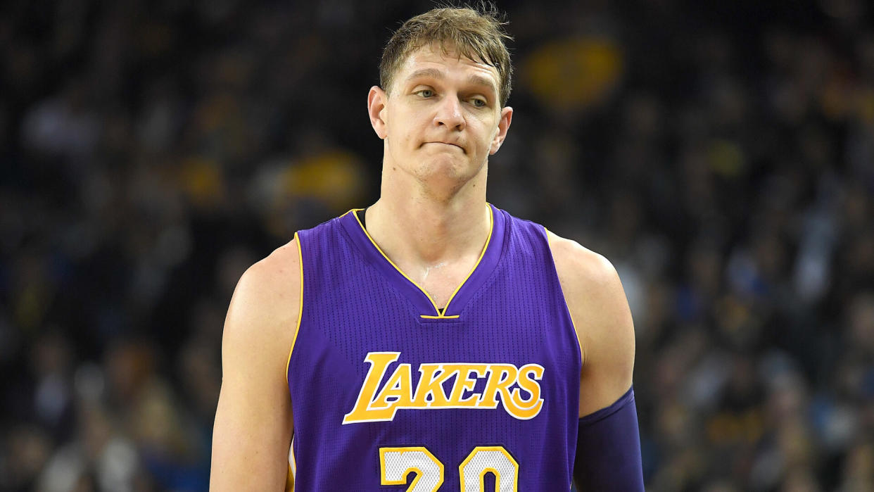 OAKLAND, CA - NOVEMBER 23:  Timofey Mozgov #20 of the Los Angeles Lakers reacts as he walks off the court after picking up his third personl foul against the Golden State Warriors in the first quarter of their NBA basketball game at ORACLE Arena on November 23, 2016 in Oakland, California.