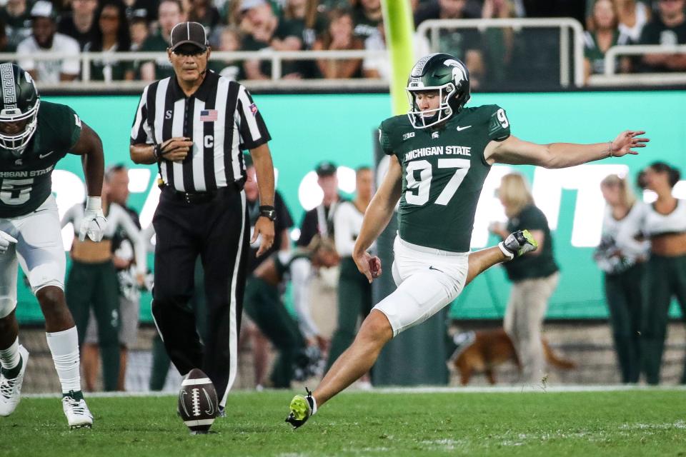Michigan State kicker Jonathan Kim kicks off against Central Michigan during the first half at Spartan Stadium in East Lansing on Friday, Sept. 1, 2023.