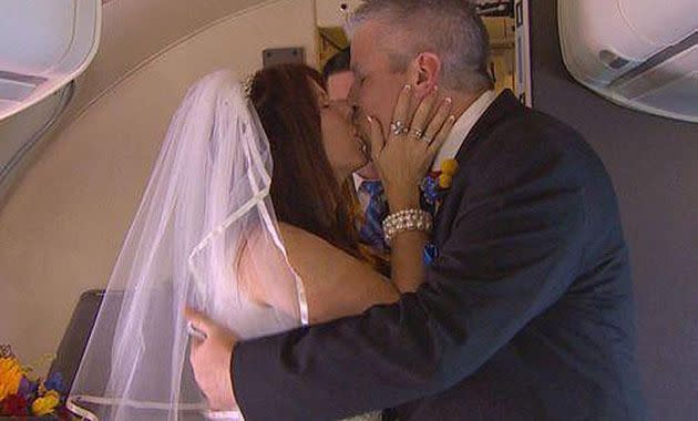 The happy couple's wedding kiss. Photo: Josh Stephen/WFAA