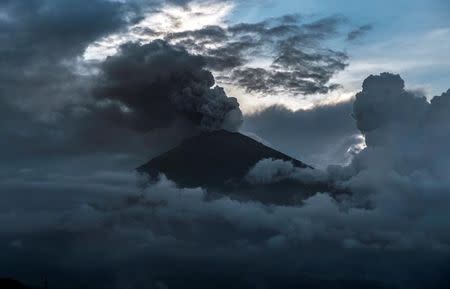 Indonesia's Mount Agung volcano erupts for a second time in less than a week as seen from the coastal town of Amed, in Bali, Indonesia November 25, 2017. Picture taken November 25, 2017. REUTERS/Petra Simkova