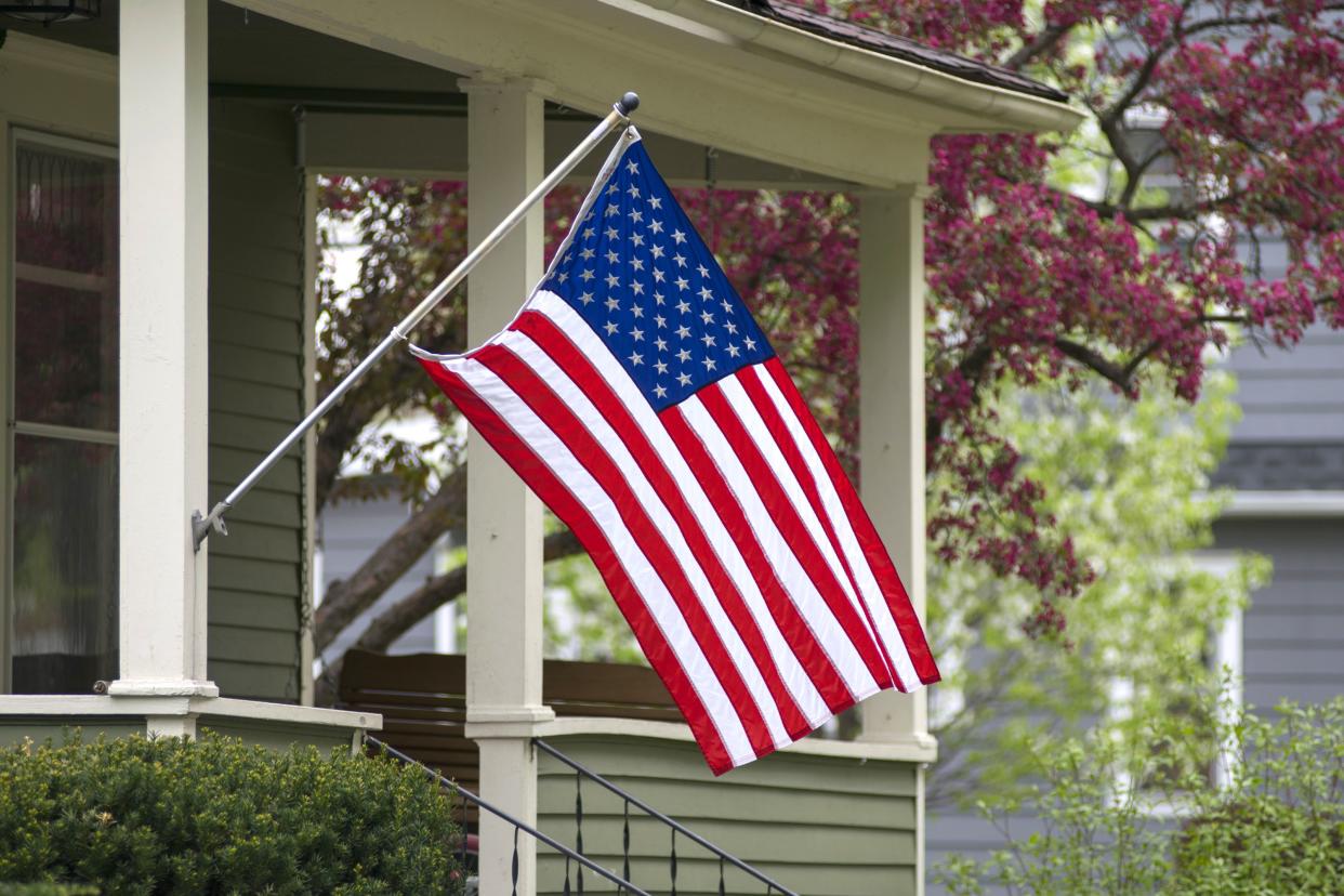 An American household has decided to mount their nations flag outside.