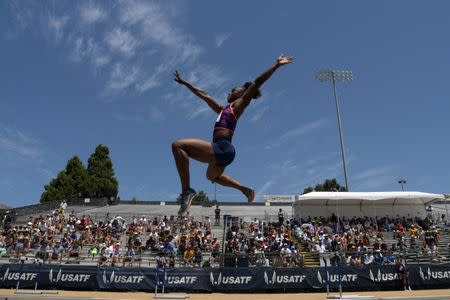 Jun 24, 2017; Sacramento, CA, USA; Tianna Bartoletta wins the women's long jump in a wind-aided 23-1 3/4 (7.05m) during the USA Championships at Hornet Stadium. Mandatory Credit: Kirby Lee-USA TODAY Sports