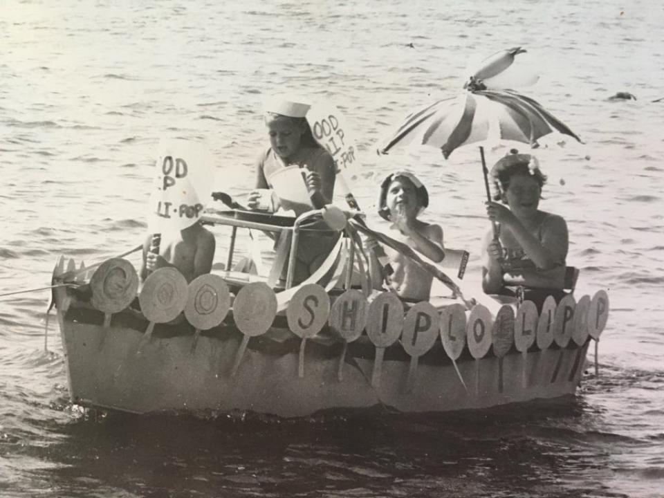 A photo of participants in a boat parade on the Watuppa Pond in the early 1960s.