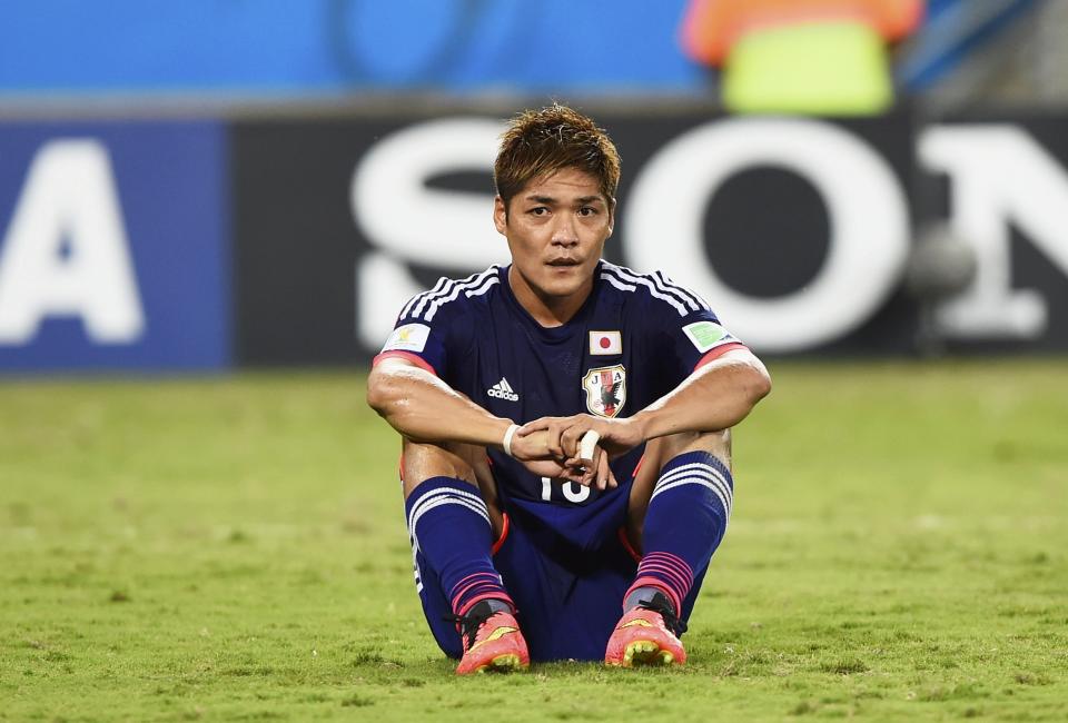 Japan's Yoshito Okubo reacts after losing their 2014 World Cup Group C soccer match to Colombia at the Pantanal arena in Cuiaba June 24, 2014. REUTERS/Dylan Martinez (BRAZIL - Tags: SOCCER SPORT WORLD CUP)