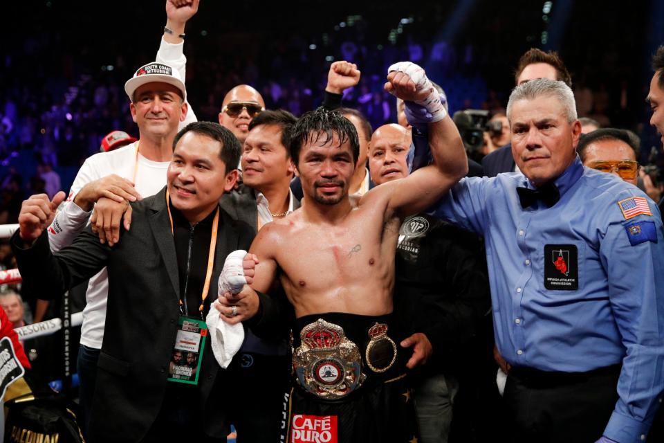 Pacquiao celebrates victory over Broner in Vegas (AP)
