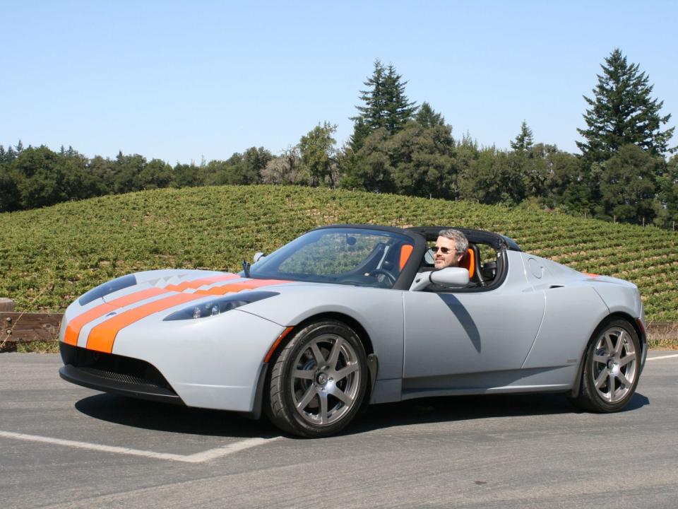 Martin Eberhard driving in his Tesla Roadster.