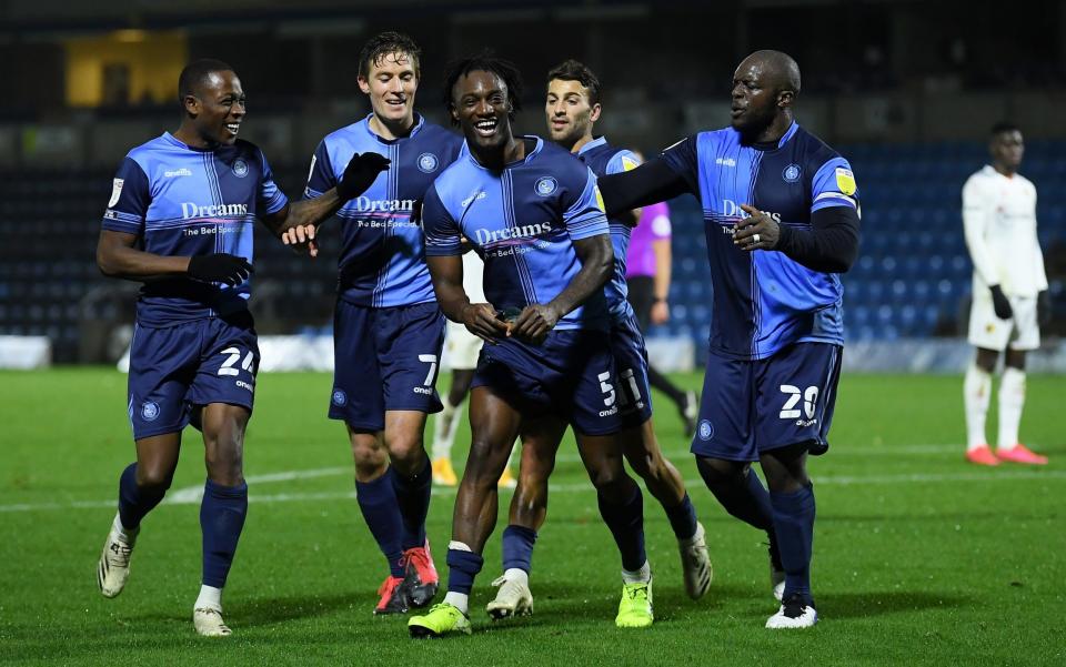 Anthony Stewart of Wycombe Wanderers celebrates after scoring his team's first goal during the Sky Bet Championship match between Wycombe Wanderers and Watford at Adams Park on October 27, 2020 in High Wycombe, England.  - GETTY IMAGES