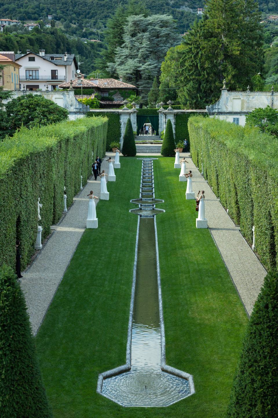 Giorgia Gabriele Wore a Custom Off-White Wedding Dress With a 26-Foot Train to Her Ceremony on Lake Como