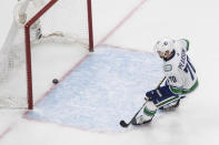 Vancouver Canucks' Tanner Pearson (70) scores an empty-net goal against the Vegas Golden Knights during the third period of Game 2 of an NHL hockey second-round playoff series, Tuesday, Aug. 25, 2020, in Edmonton, Alberta. (Jason Franson/The Canadian Press via AP)