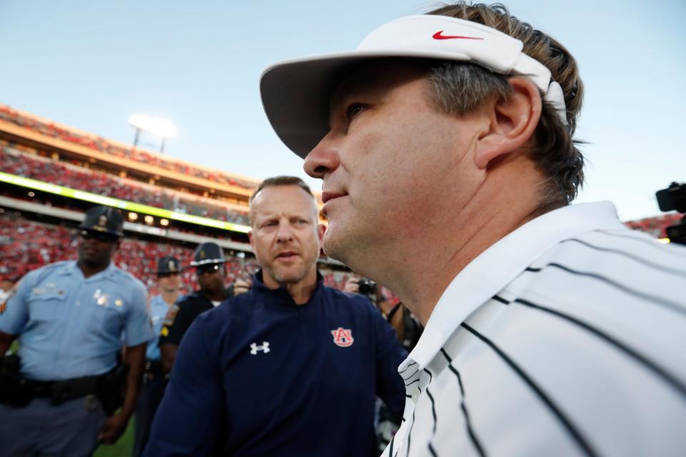 Auburn Tigers head coach Bryan Harsin and Georgia coach Kirby Smart shake hands after a NCAA college football game between Auburn and Georgia in Athens, Ga., on Saturday, Sept. 8, 2022. Georgia won 42-10.