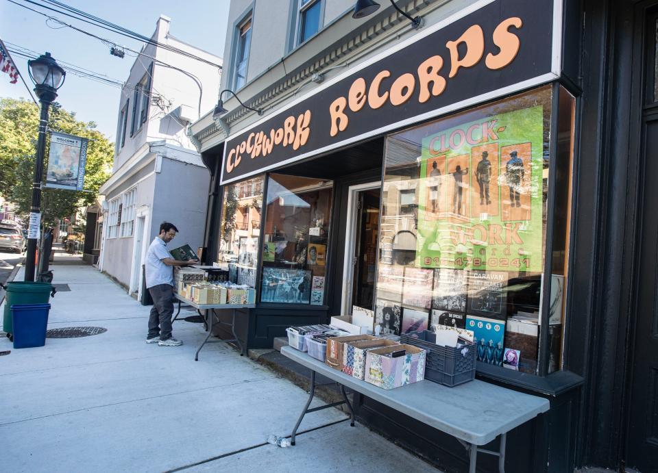 A customer browses vinyl record albums outside Clockwork Records in Hastings-on-Hudson Sept. 14, 2023. For the first time since 1987, more vinyl albums were sold in 2022 than CDs.