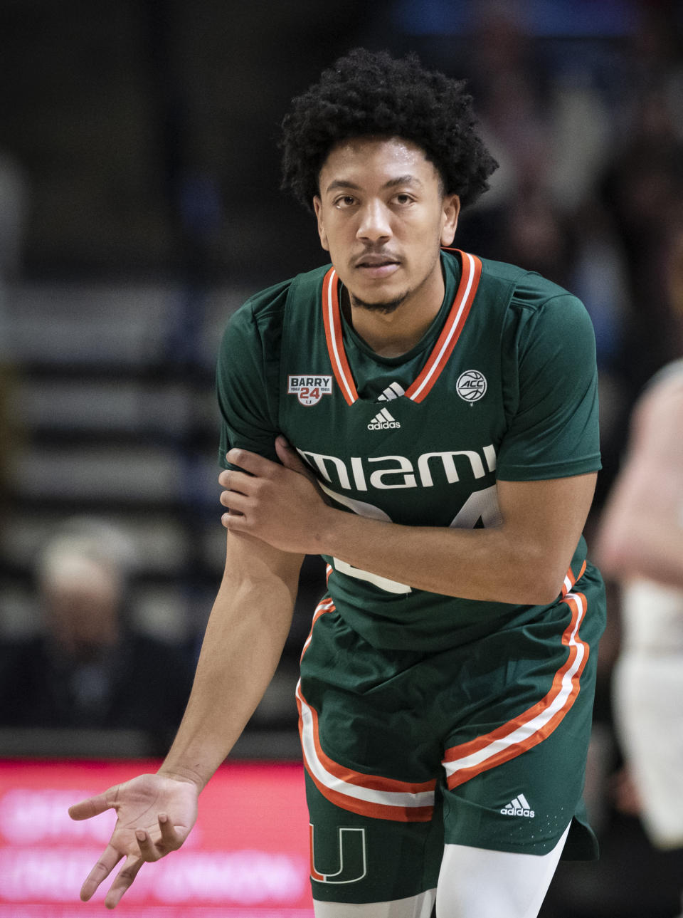 Miami guard Nijel Pack (24) celebrates after a 3-point basket in the first half of an NCAA college basketball game against Wake Forest, Saturday, Jan. 6, 2024 in Winston-Salem, N.C. (Allison Lee Isley/The Winston-Salem Journal via AP)