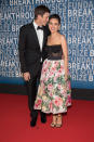 <p>The gorgeous couple smiled and laughed as they walked the red carpet Sunday at the 2018 Breakthrough Prize at NASA Ames Research Center in Mountain View, Calif. The<em> Ranch</em> star took a minute to whisper something into his wife’s ear as they headed into the event celebrating the best scientific work of the year. (Photo: Miikka Skaffari/Getty Images) </p>