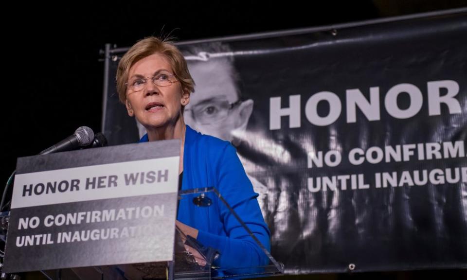 Elizabeth Warren addresses the crowd at the court.