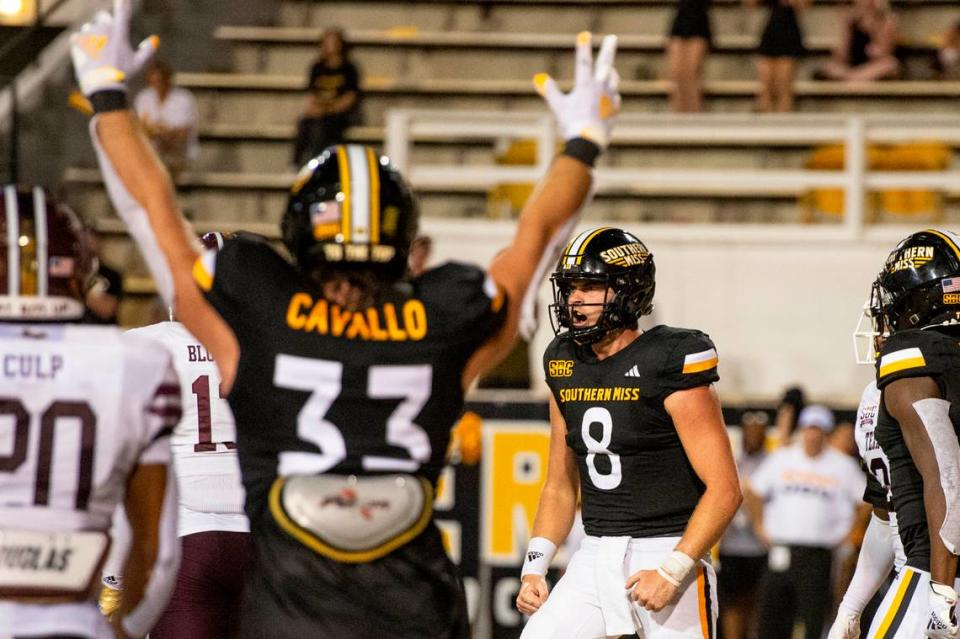 Southern Miss Golden Eagles quarterback Billy Wiles (8) celebrates after scoring a touchdown during a game against Texas State at M.M. Roberts Stadium in Hattiesburg on Saturday, Sept. 30, 2023. Hannah Ruhoff/Sun Herald