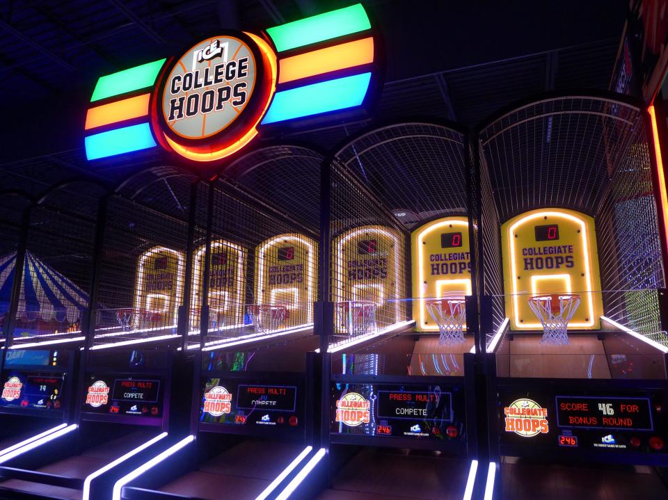 Dave & Buster's Entertainment in West Des Moines has games galore from Space Invaders and Pac-Man to basketball hoops and coin pushes. Here's College Hoops.