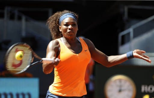 American player Serena Williams returns the ball to Italian player Sara Errani during their women's singles semi-final tennis match at the Madrid Masters at the Magic Box (Caja Magica) sports complex in Madrid on May 11, 2013. Williams won the match 7-5, 6-2