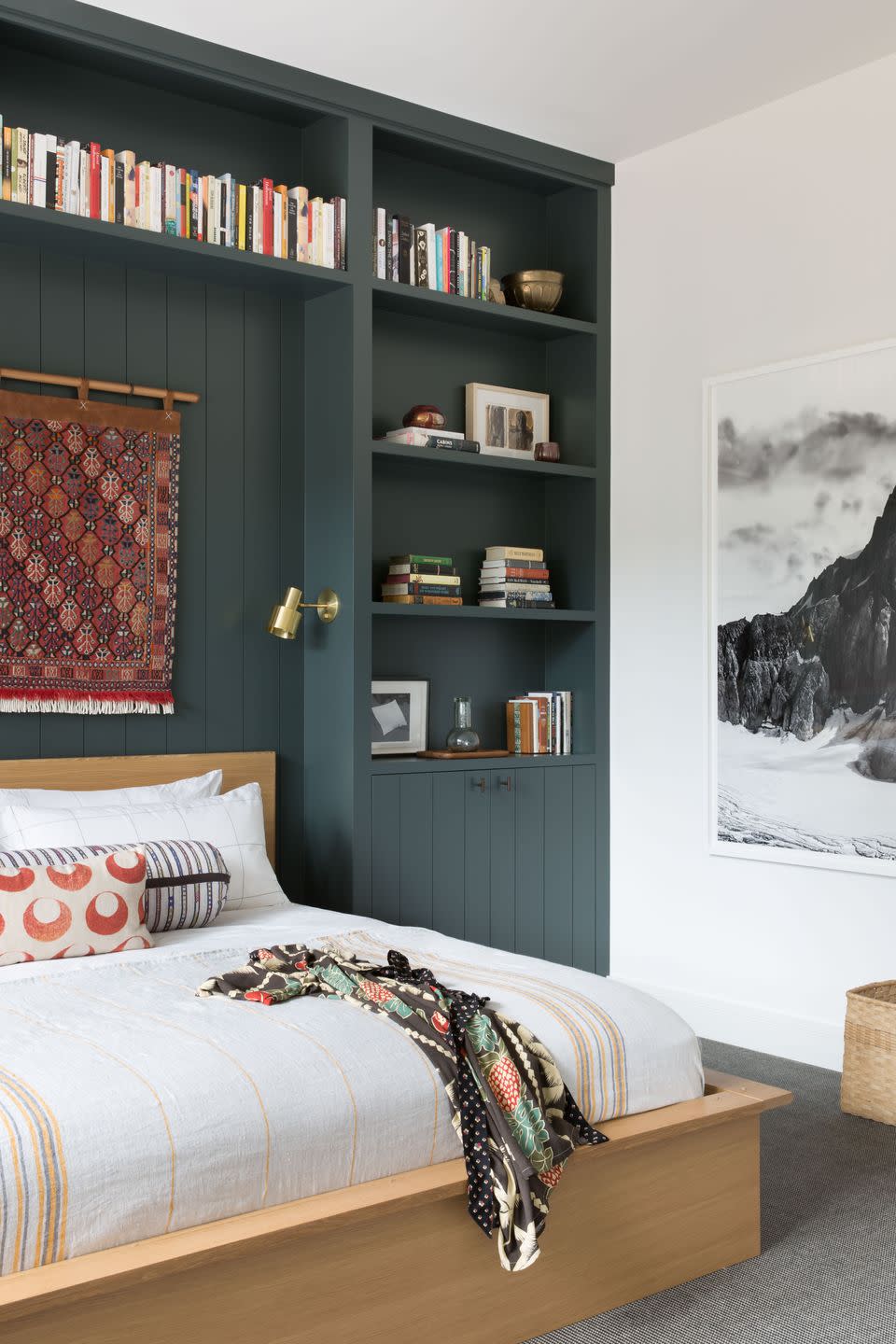 a bedroom with a bookcase