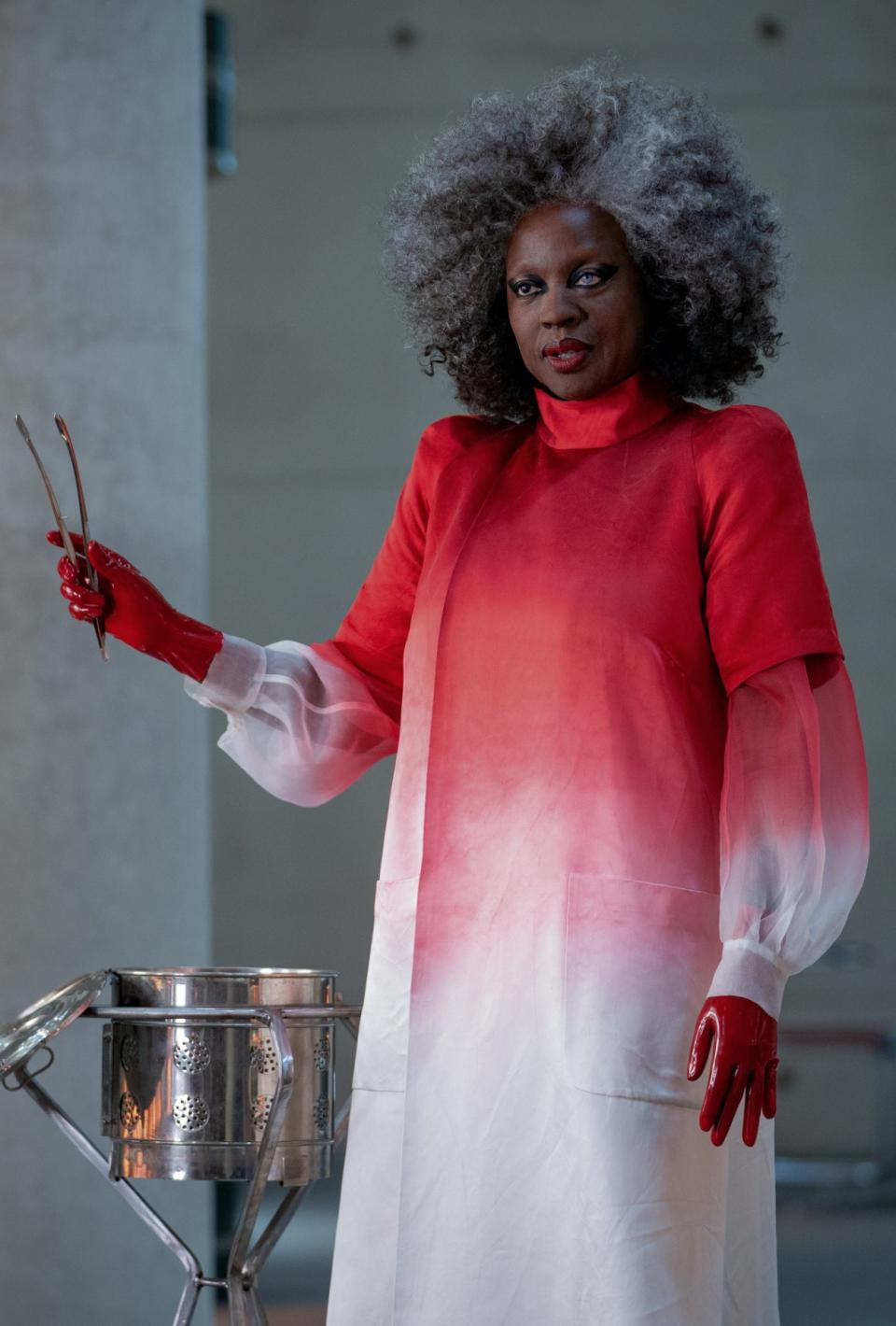 <div><p>"With Gaul’s lab coat, we used a duchess silk and washed it so it could get this kind of veining through it," Trish explained. "Then ombre dyed it in red. I like using red in that stark cold environment – it empowers the presence of Dr. Gaul."</p></div><span> Lionsgate</span>