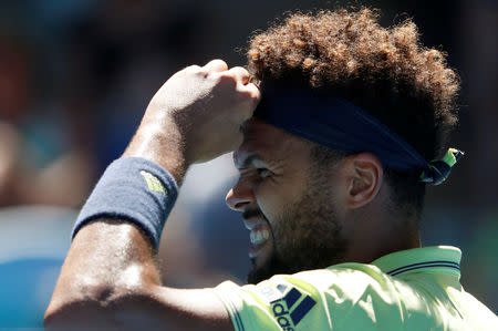 FILE PHOTO: Tennis - Australian Open - Margaret Court Arena, Melbourne, Australia, January 17, 2018. Jo-Wilfried Tsonga of France reacts during his match against Denis Shapovalov of Canada. REUTERS/Edgar Su/File Photo