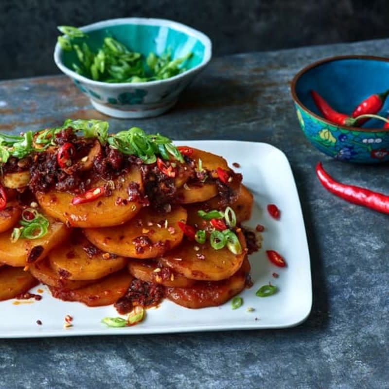 <p>Punch Fork</p><p>Thinly s;iced potatoes cooked until soft and spiced up with chili crisp oil.</p><p><strong>Get the recipe here: <a href="https://www.punchfork.com/recipe/Spicy-Chili-Crisp-Potato-Salad-Liang-Ban-Tu-Dou-EatingWell" rel="nofollow noopener" target="_blank" data-ylk="slk:Spicy Chili Crisp Potato Salad;elm:context_link;itc:0;sec:content-canvas" class="link ">Spicy Chili Crisp Potato Salad</a></strong></p>