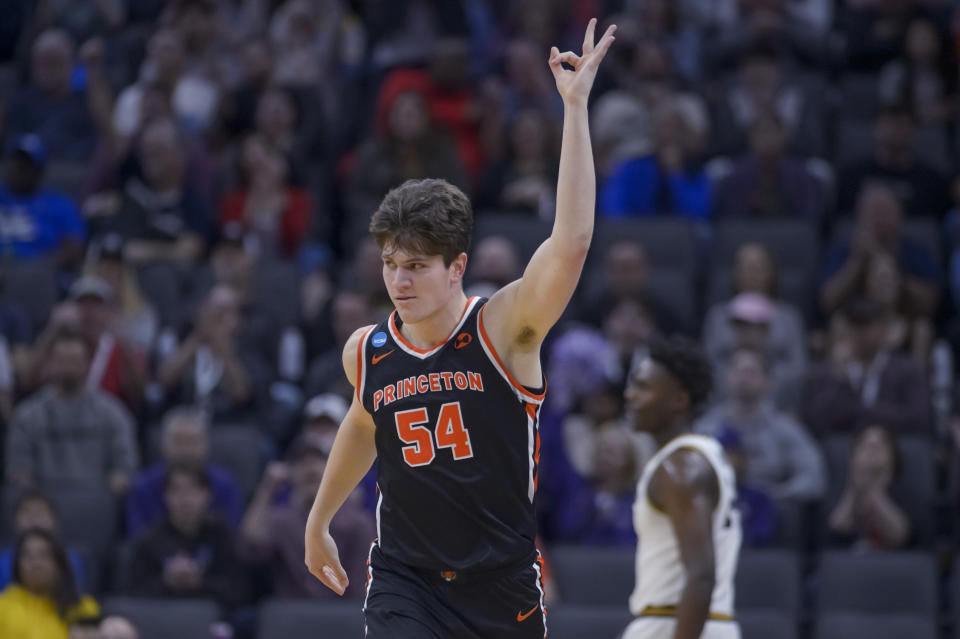 Princeton forward Zach Martini reacts after scoring on a 3-point shot during the first half of the team's second-round college basketball game against Missouri in the men's NCAA Tournament in Sacramento, Calif., Saturday, March 18, 2023. (AP Photo/Randall Benton)