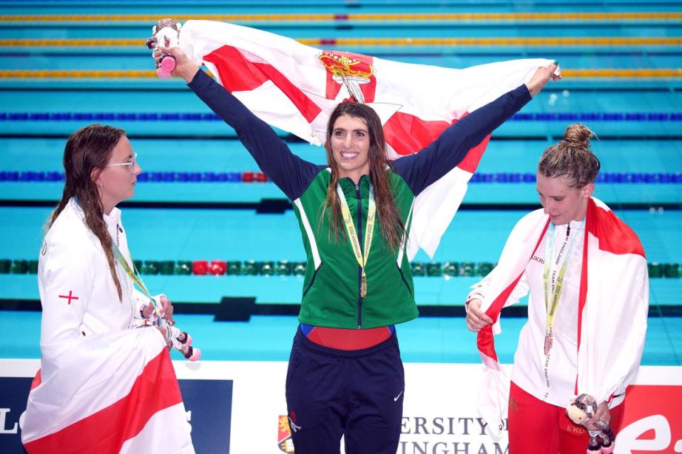 Bethany Firth, centre, claimed Northern Ireland’s first ever gold medal in the pool (Peter Byrne/PA) (PA Wire)