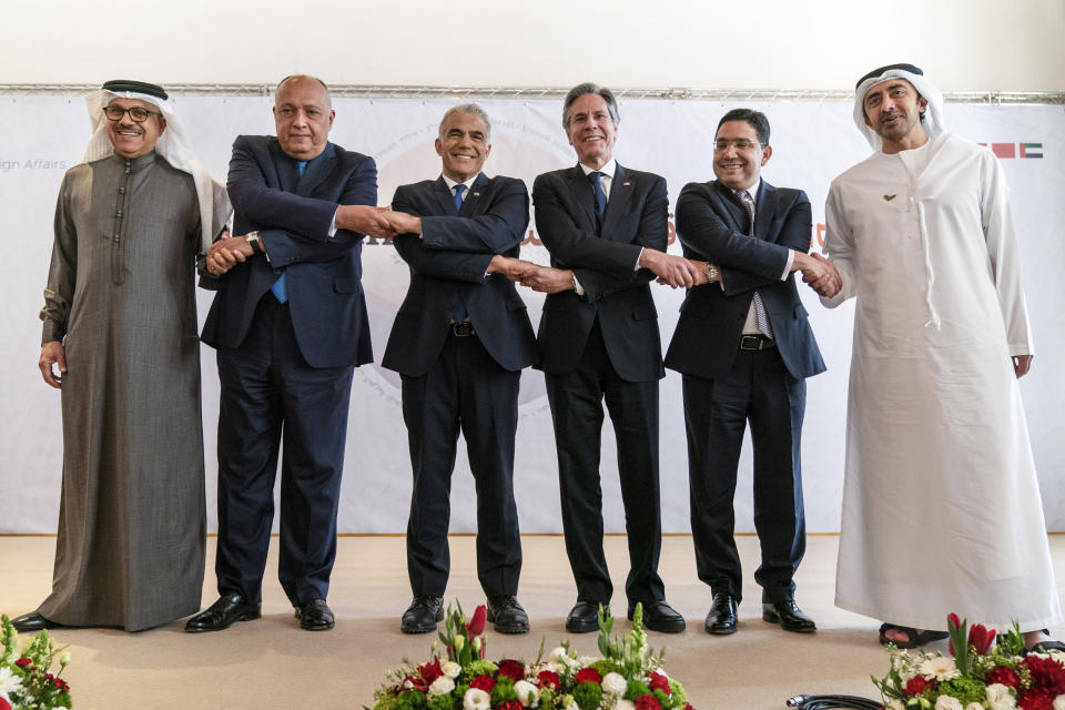 After meeting for the Negev Summit, Bahrain's Foreign Minister Abdullatif bin Rashid al-Zayani, left, Egypt's Foreign Minister Sameh Shoukry, Israel's Foreign Minister Yair Lapid, U.S. Secretary of State Antony Blinken, Morocco's Foreign Minister Nasser Bourita, and United Arab Emirates' Foreign Minister Sheikh Abdullah bin Zayed Al Nahyan, pose for a photograph Monday, March 28, 2022, in Sde Boker, Israel. (AP Photo/Jacquelyn Martin, Pool)