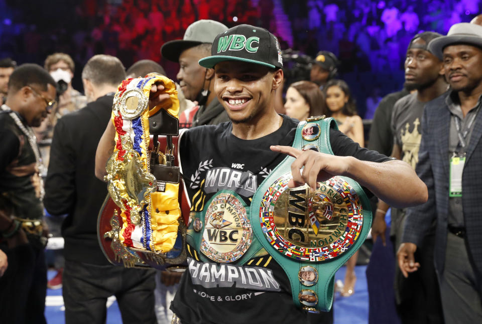 LAS VEGAS, NEVADA - APRIL 30:  WBO junior lightweight champion Shakur Stevenson poses with belts after defeating WBC champion Oscar Valdez in a title unification fight at MGM Grand Garden Arena on April 30, 2022 in Las Vegas, Nevada. Stevenson took the WBC title by unanimous decision.  (Photo by Steve Marcus/Getty Images)