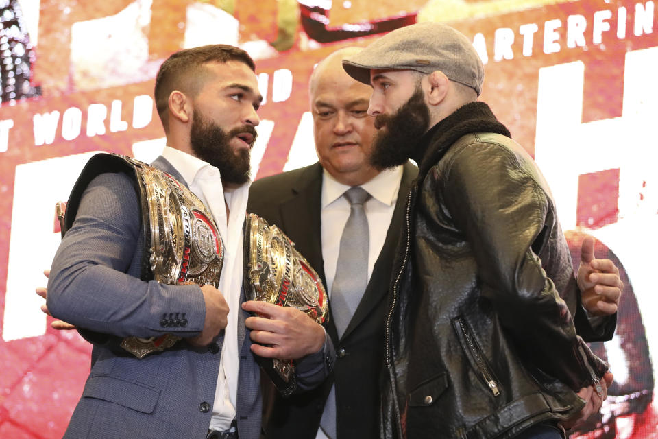 Patricio 'Pitbull' Freire, left, squares off with Pedro Carvalho at a news conference promoting the Bellator Spring & Summer fight cards on Monday, March 9, 2020, in New York City. (AP Photo/Gregory Payan)