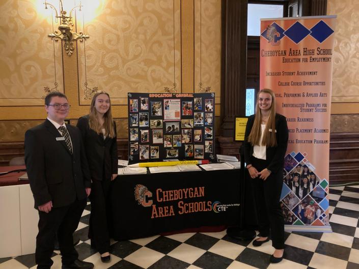 Cheboygan High School Career and Technical Education Introduction to Teaching students Madison Farver, Adam Monusko, and Rachel Swiderek recently represented the school district in Lansing, talking about the programs at the high school with local lawmakers.