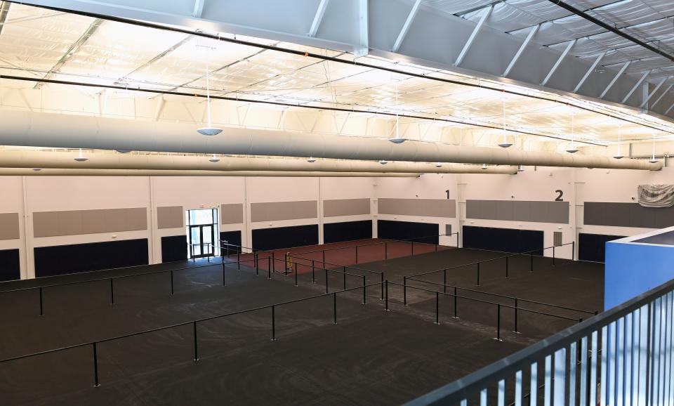 The Sarasota Pickleball Club features 12 indoor courts with an observation deck overlooking both sides of the building's pickleball courts. A similar facility is expected to be built in Green Acres. The same owners have a parcel on South Haverhill Road under contract and expect to open within two years.
(Credit: THOMAS BENDER/HERALD-TRIBUNE)
