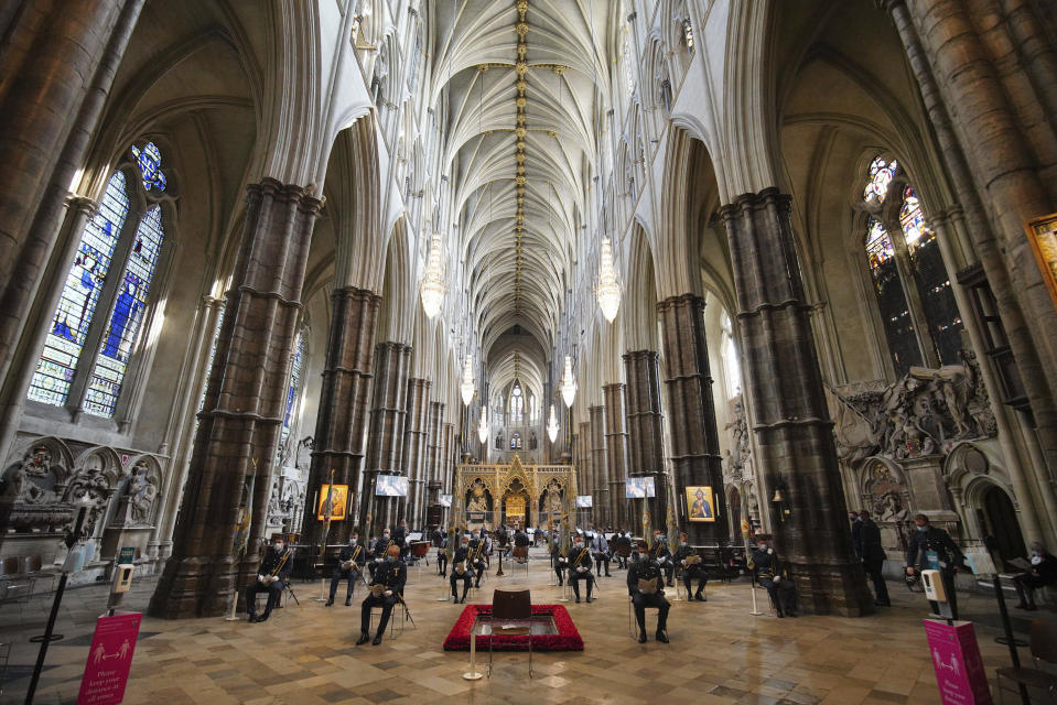 People attend a service to mark the 80th anniversary of the Battle of Britain at Westminster Abbey, London, Sunday, Sept. 20, 2020. (Aaron Chown/Pool Photo via AP)