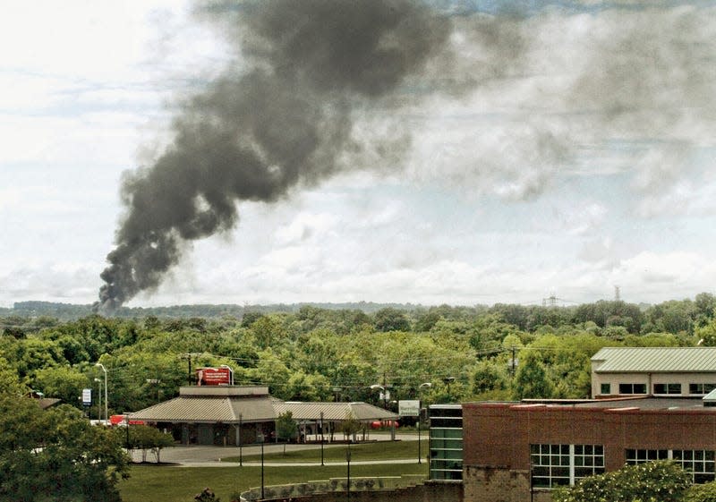 Smoke rises from the derailment site over Maryville on July 2, 2015.