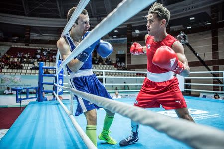 Robeisy Ramirez of Cuba in action against Arslan Khataev of Finland. To match story OLYMPICS-BOXING/BAKU Karim de la Plaine/AIBA/Handout via REUTERS