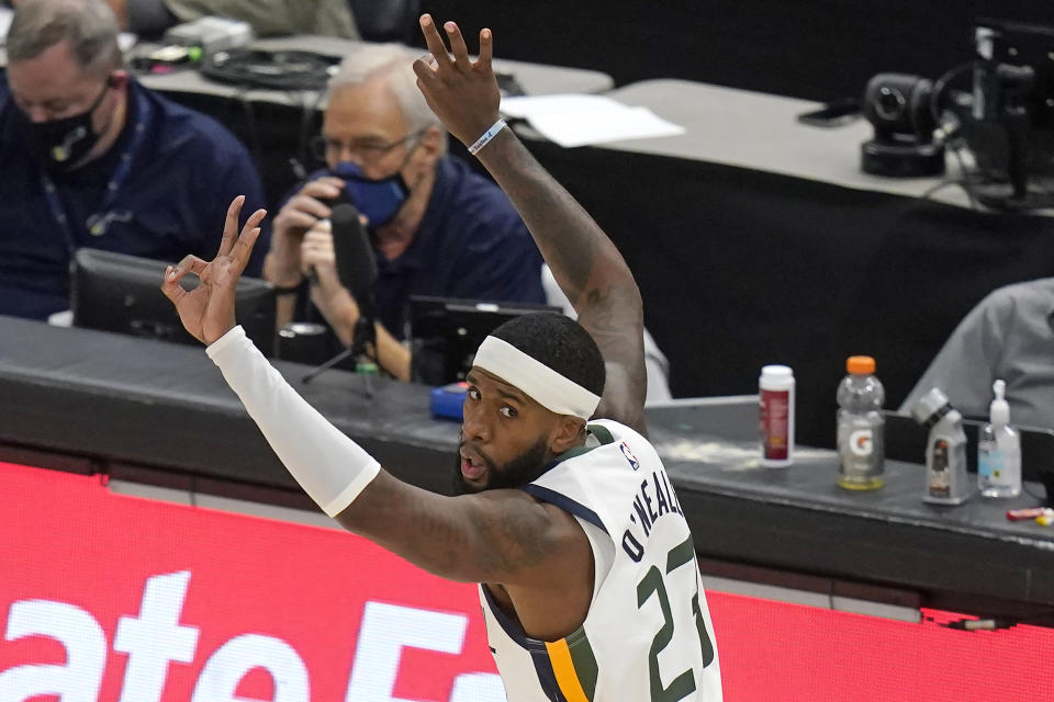 Utah Jazz forward Royce O'Neale (23) celebrates after scoring a 3-pointer against the New Orleans Pelicans during the second half of an NBA basketball game Thursday, Jan. 21, 2021, in Salt Lake City. (AP Photo/Rick Bowmer)