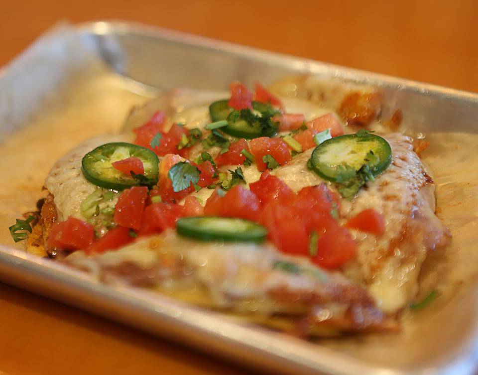 A pizza tostada is currently a limited edition offering at the Taco Reho's locations in Rehoboth Beach and Middletown.