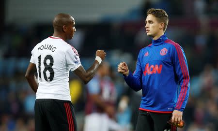 Aston Villa v Manchester United - Barclays Premier League - Villa Park - 14/8/15. Manchester United's Adnan Januzaj and Ashley Young celebrate at the end of the match. Action Images via Reuters / Andrew Couldridge