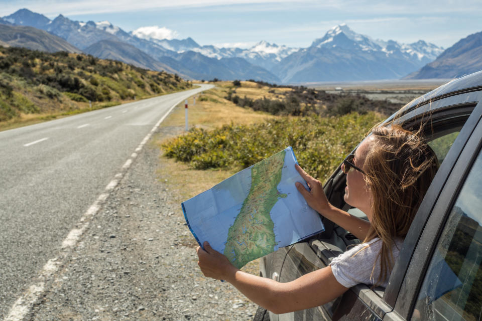 A tourist seen on the side of the road in New Zealand. 