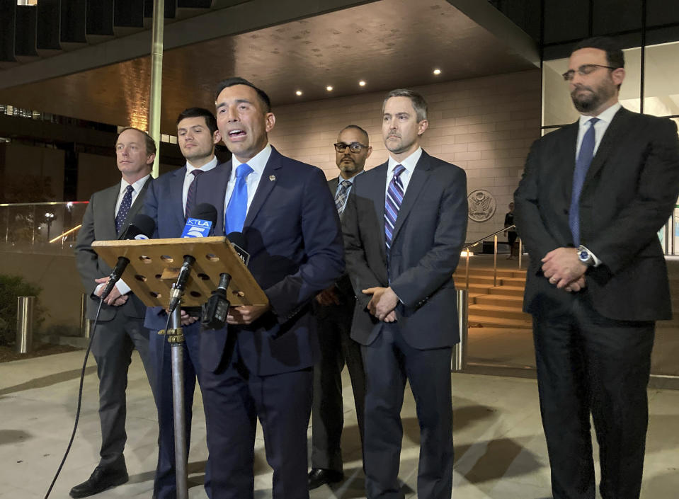 U.S. Attorney Martin Estrada and prosectors talk at a news conference after a verdict at federal court in Los Angeles, Monday, Nov. 6, 2023. A federal jury found that scuba dive boat captain Jerry Boylan was criminally negligent in the deaths of 34 people killed in a fire aboard the vessel in 2019, the deadliest maritime disaster in recent U.S. history. (AP Photo/Stefanie Dazio)