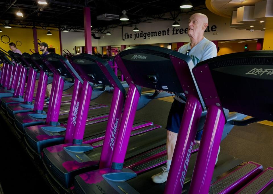 Ron Abbott, 80, of Palm Bay, works out on a treadmill at the Planet Fitness club on Malabar Road in Palm Bay. Abbott said he has been working out for more than three decades.